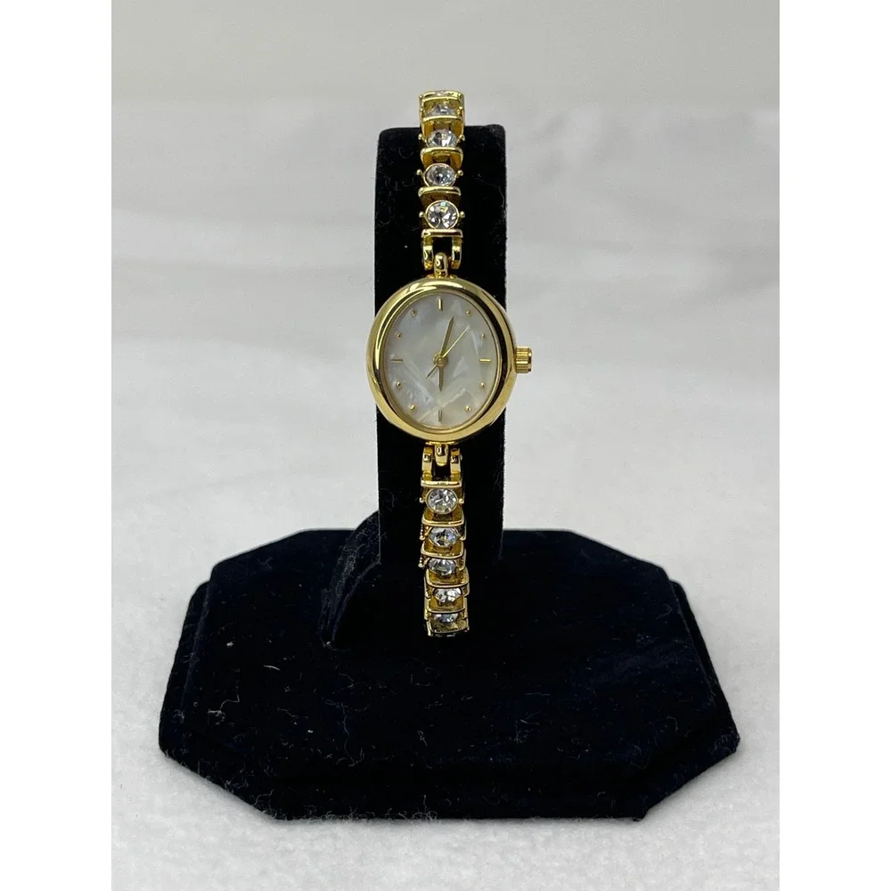 Gold Tone Mother of Pearl Face CZ Tennis Bracelet Watch Japan Movement